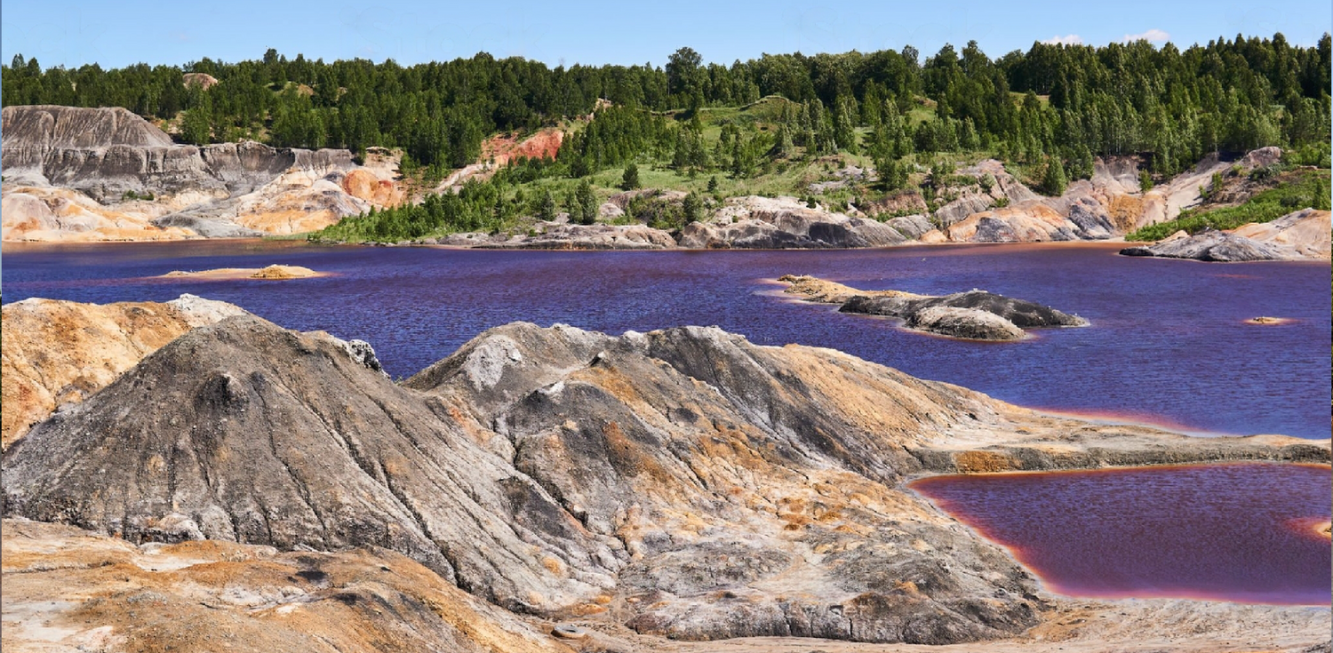 Brazilian purple clay - A photo of Brazilian purple clay in its natural state, as found in the earth. The clay is a rich purple color with a fine, powdery texture. It is rich in minerals such as copper, magnesium, and manganese, and is known for its ability to detoxify and revitalize the skin. Brazilian purple clay is commonly used in skincare products, as it helps to remove impurities, while also promoting a healthy and radiant complexion.